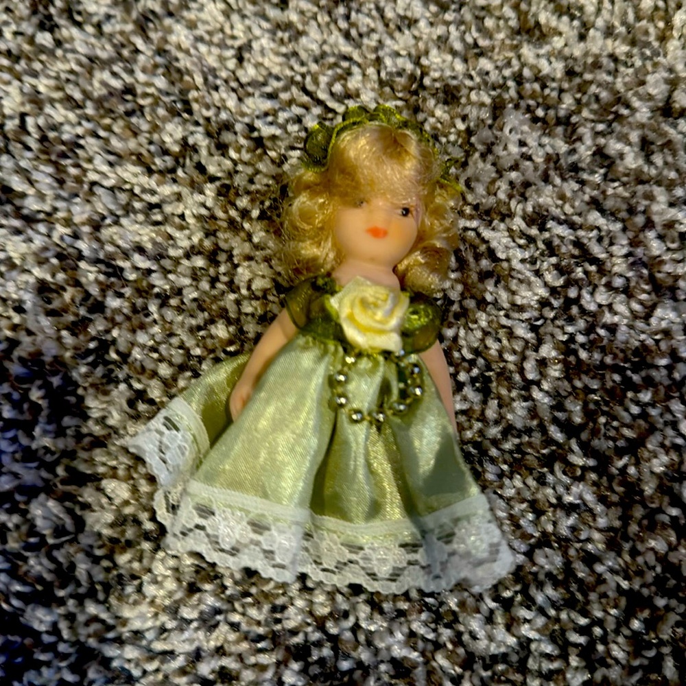 Vintage mini doll.